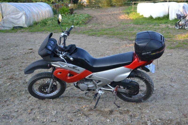 Kymco 125 na plastikach Hondy !